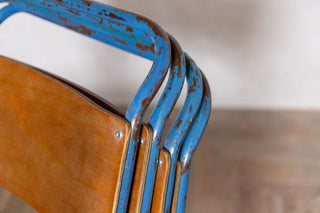 vintage-blue-stacking-chairs-stacked