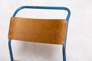 vintage-blue-stacking-chair-backrest