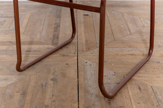 vintage-burgundy-stacking-chair-leg