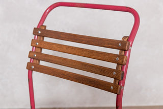 vintage-red-slatted-stacking-chair-backrest