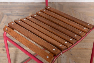 vintage-red-slatted-stacking-chair-seat