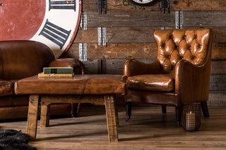 chesterfield-style-tan-armchair-in-home