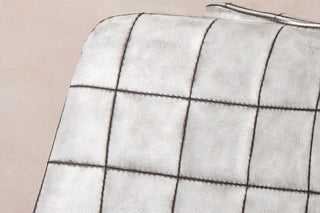 white faux leather chair