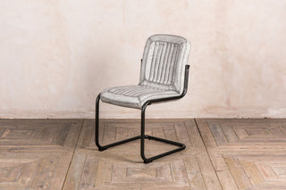 white leather look dining chair