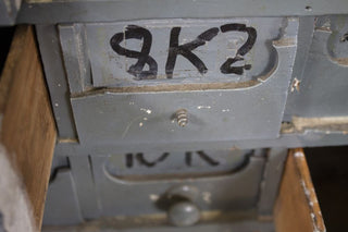 wooden bank of drawers