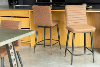 woodstock-faux-leather-stools-warm-tan-at-bar