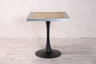 zinc-edge-table-with-tulip-style-base