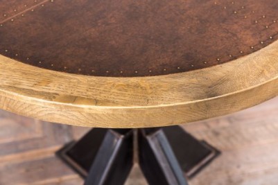 tank trap table with round copper top