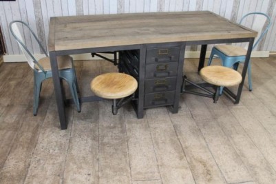 industrial style desk with swing out seats