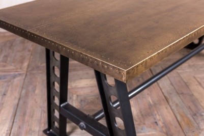 large dining table with brass top