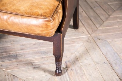 distressed tan leather dark wood chair
