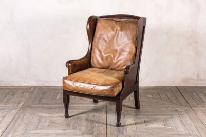 tan leather wood frame armchair