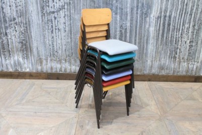 black framed stacking chairs