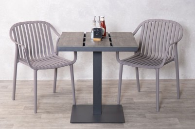 table-and-dark-grey-chairs