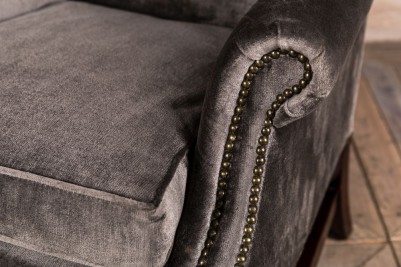 dark grey velvet armchair