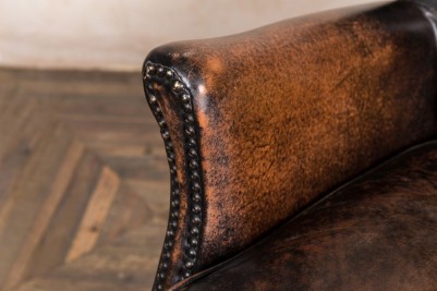 antique brown traditional style armchair