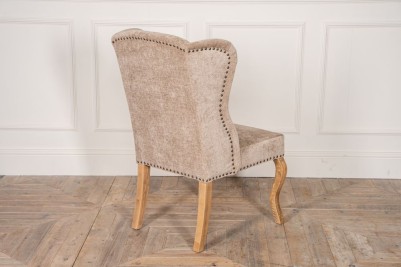 upholstered wheat chair