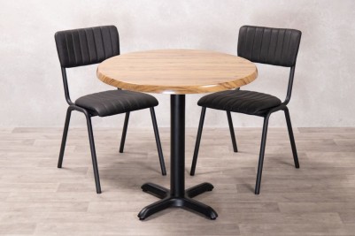 aged-pine-round-top-with-x-bottom-base-and-chairs