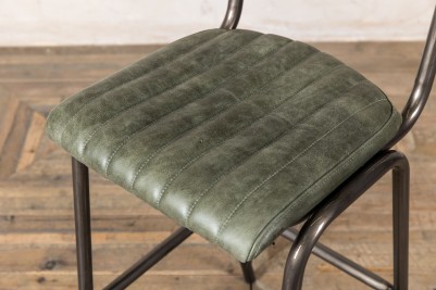 green leather restaurant stool