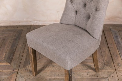 close-up-upholstered-dining-chair-stone
