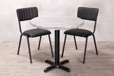 cement-round-top-with-x-bottom-base-and-chairs