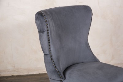 grey button back chair