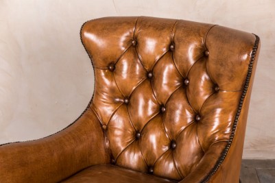 leather button back armchair