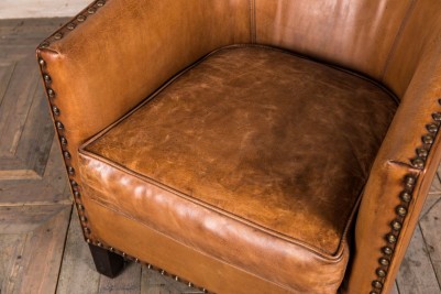 tan leather tub chair