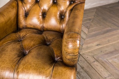 buttoned leather chair
