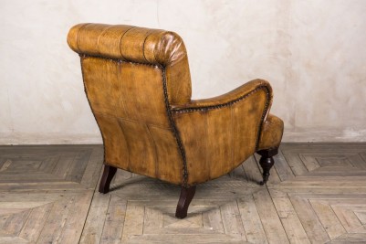 tan leather armchair