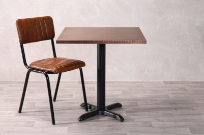 copper-table-with-x-bottom-base-and-arlington-chair
