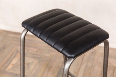 upholstered backless bar stool