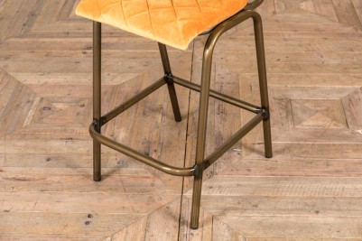 yellow velvet stool with brass finish
