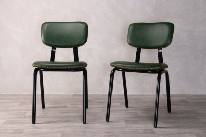 pair-of-green-dining-chairs