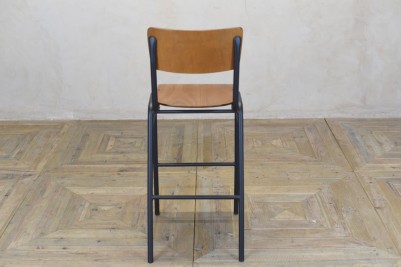 black wooden and metal stool