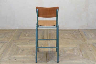 dark green metal stool