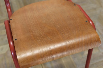 red and wooden bar stool