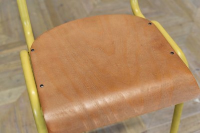 yellow metal stool