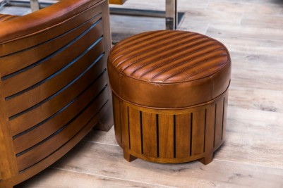 brown-leather-pouf-seat-in-home