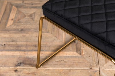 black gold legged chair