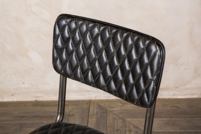 black quilted dining chair