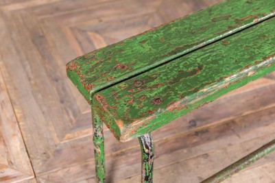 green industrial dining bench