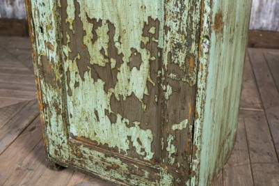 cabinet with flaked paint