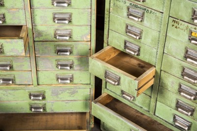 tall wooden filing drawers