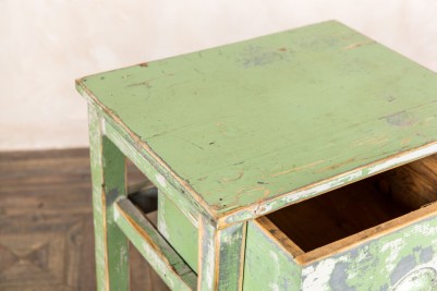 green bedside table