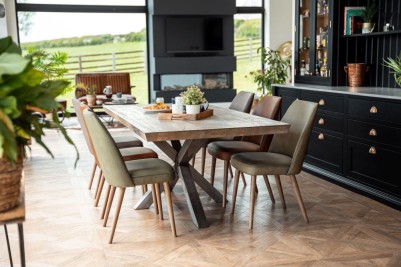 Theron Leather Dining Chairs Around a Table