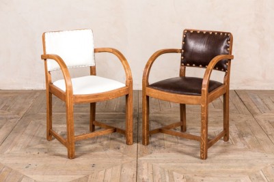 pair-of-un-upholstered-chairs