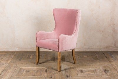 pink button back chair
