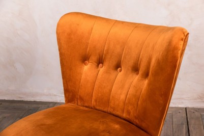 small burnt orange cocktail chair