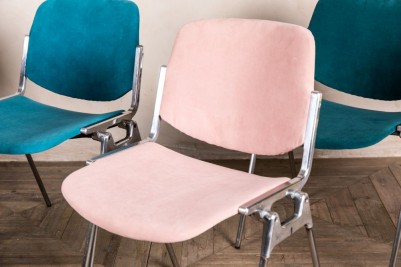 pink upholstered stacking chair